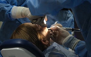 Woman getting dental treatment